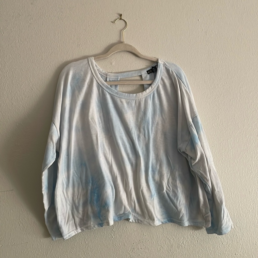 Cute crop sweater. Cloud blue and white with cross back. Back is open.